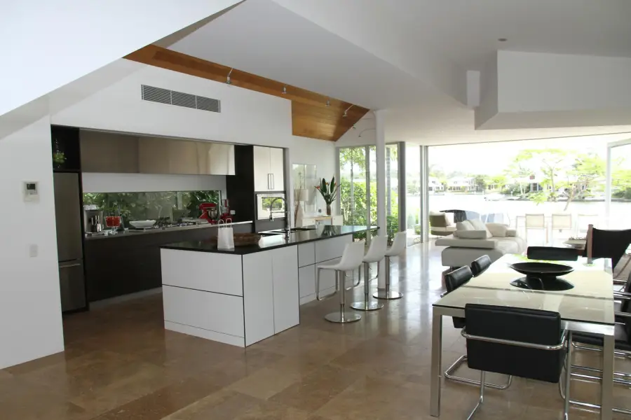 modern design kitchen with mirror backsplash