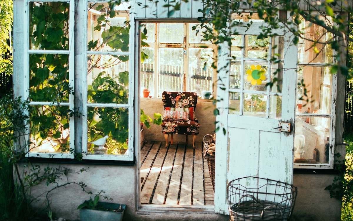 How to Start a Small Garden on a Balcony in Apartments - Greenhouse with colorful folding chair Love my work? buy me a coffee ☕ PayPal - a.smit@mac.com