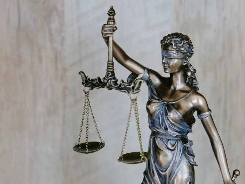 property dispute legal help - Lady Justice background.