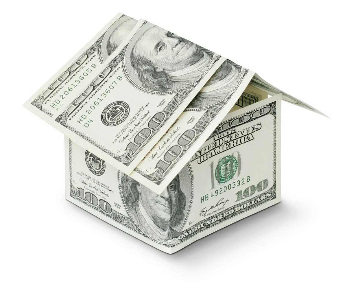 best hard money lenders for flipping houses - Symbolic house made from one hundred dollars isolated on white background