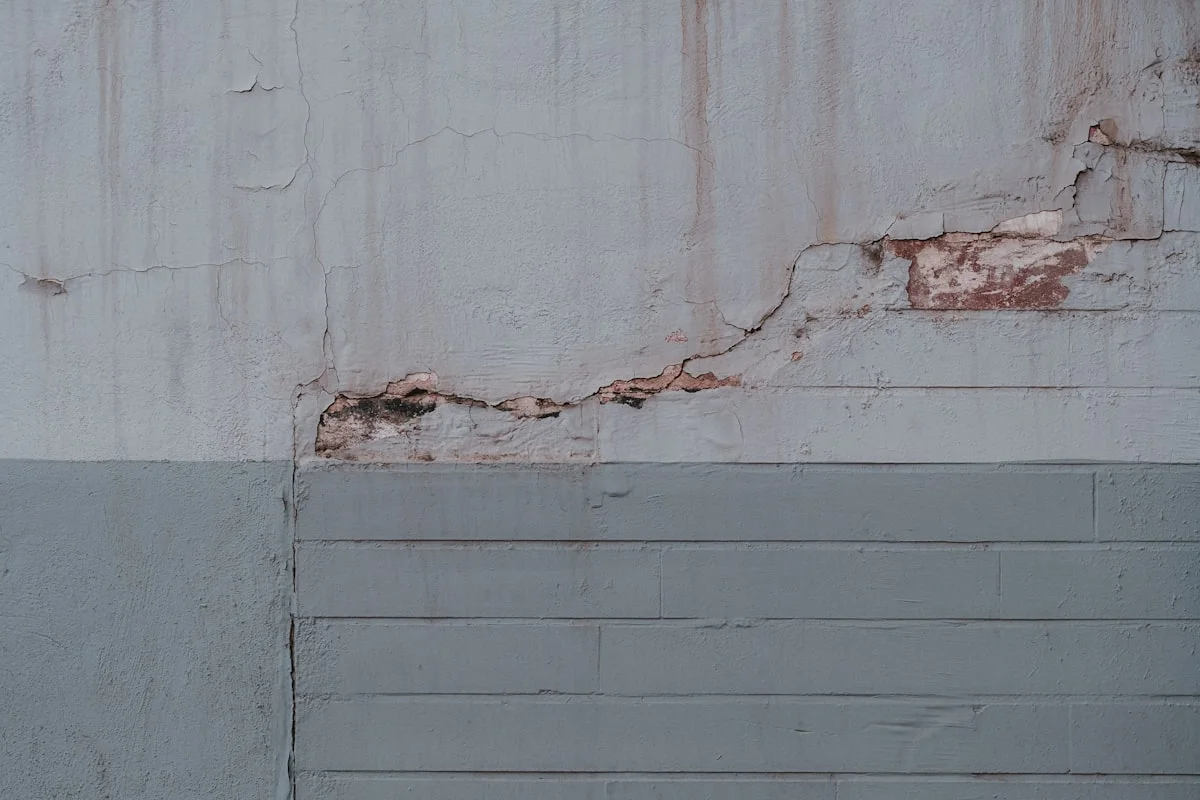 best way to remove stubborn paint from brick exterior - texture of a grey wall