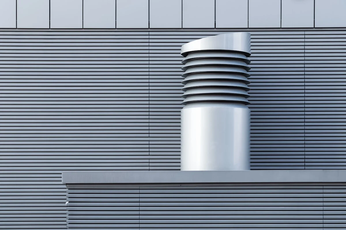 cost to replace a water heater in texas - This is the side wall of a warehouse. And I assume the structure to the right is some kind of ventilation duct.